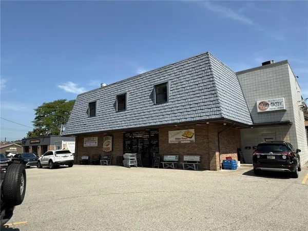 a car parked in front of a building
