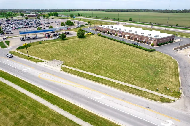 a view of swimming pool with a garden and seating area