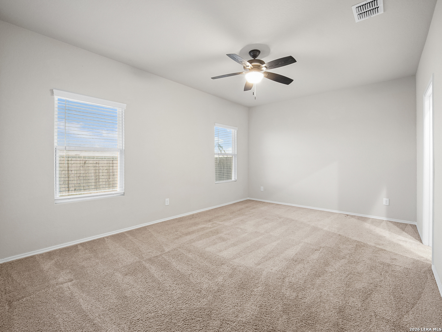 3019 Pacific Coast Converse, TX 78109 - Photo 11 of 31 a view of an empty room with a window