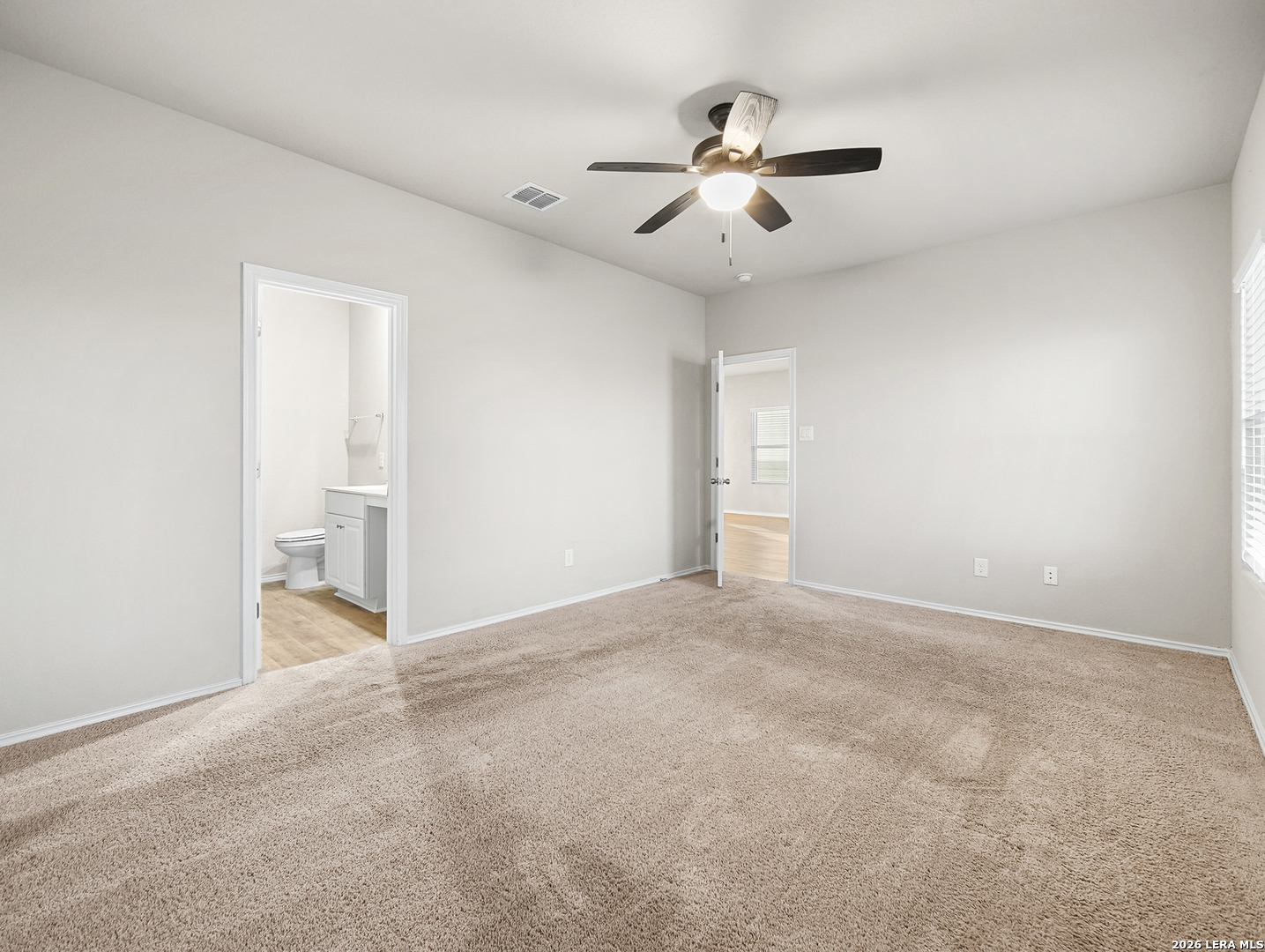 3019 Pacific Coast Converse, TX 78109 - Photo 12 of 31 an empty room with fan and windows