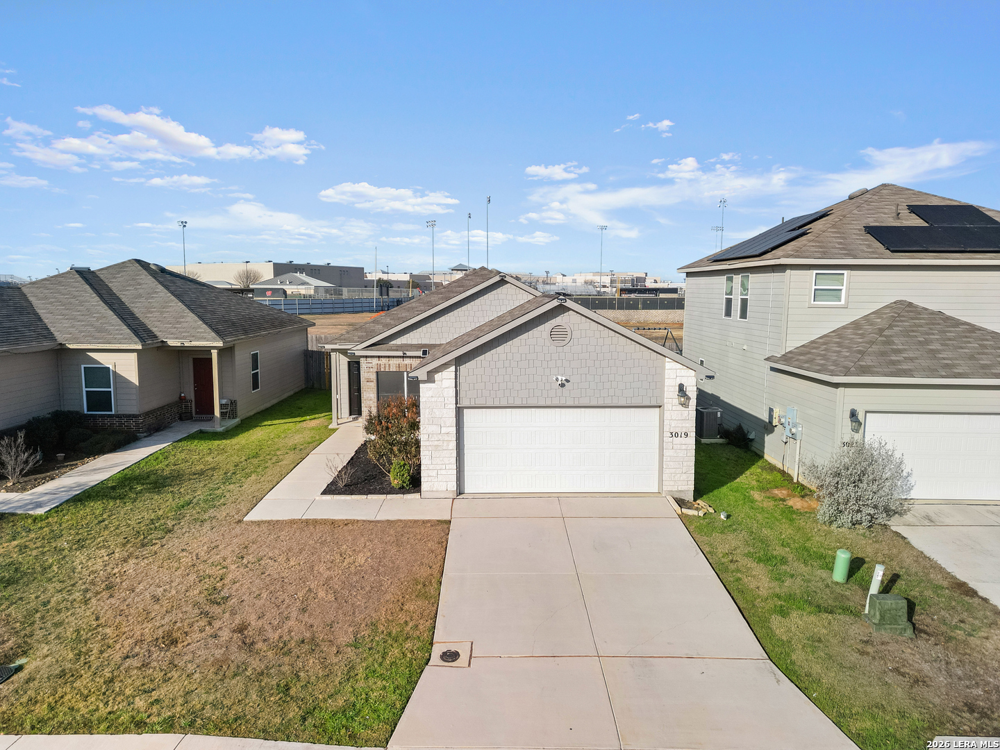 3019 Pacific Coast Converse, TX 78109 - Photo 23 of 31 a front view of a house with a yard