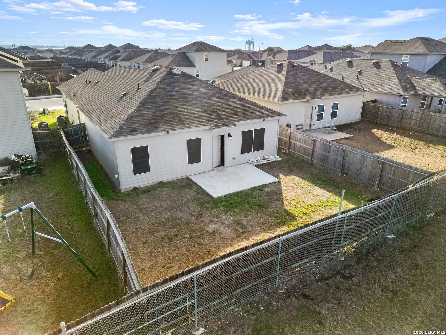 3019 Pacific Coast Converse, TX 78109 - Photo 25 of 31 a view of a house with pool and a yard