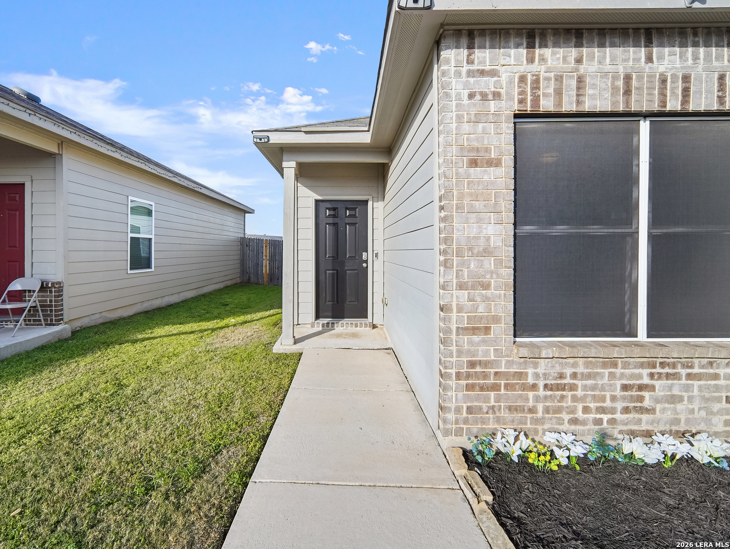 3019 Pacific Coast Converse, TX 78109 - Photo 3 of 31 a front view of a house with a garden