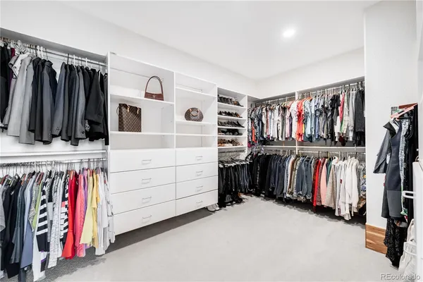 a utility room with sink dryer and washer