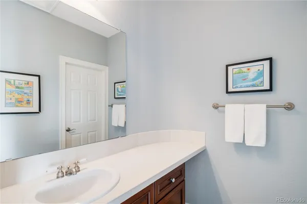 a bathroom with a sink and a cabinet