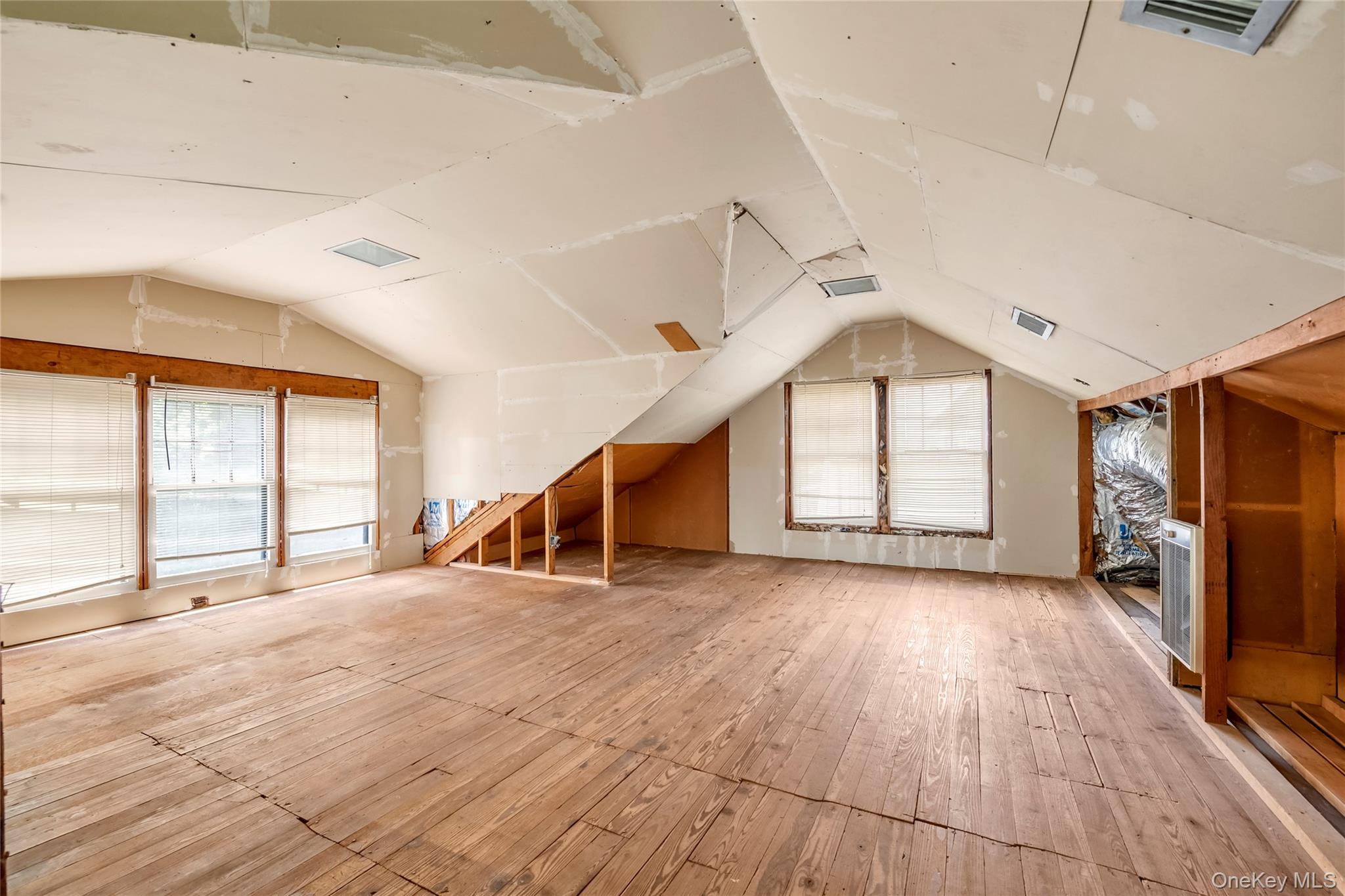 328 Manor Road Queens, NY 11363 - Photo 19 of 30 Walk up attic - 4th bedroom or living area