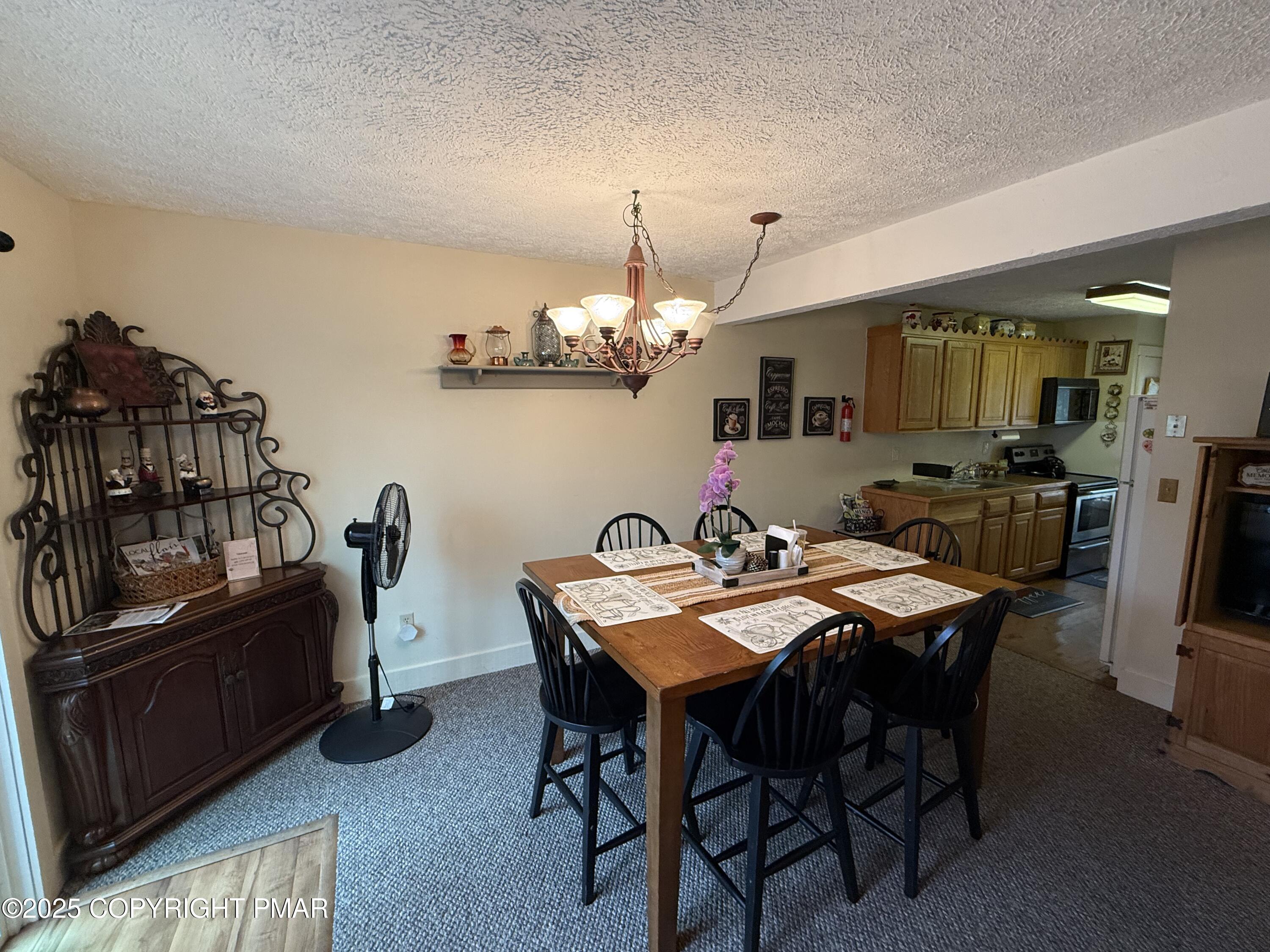 120 Snow Ridge Circle Lake Harmony, PA 18624 - Photo 12 of 29 Dining room next to rear patio
