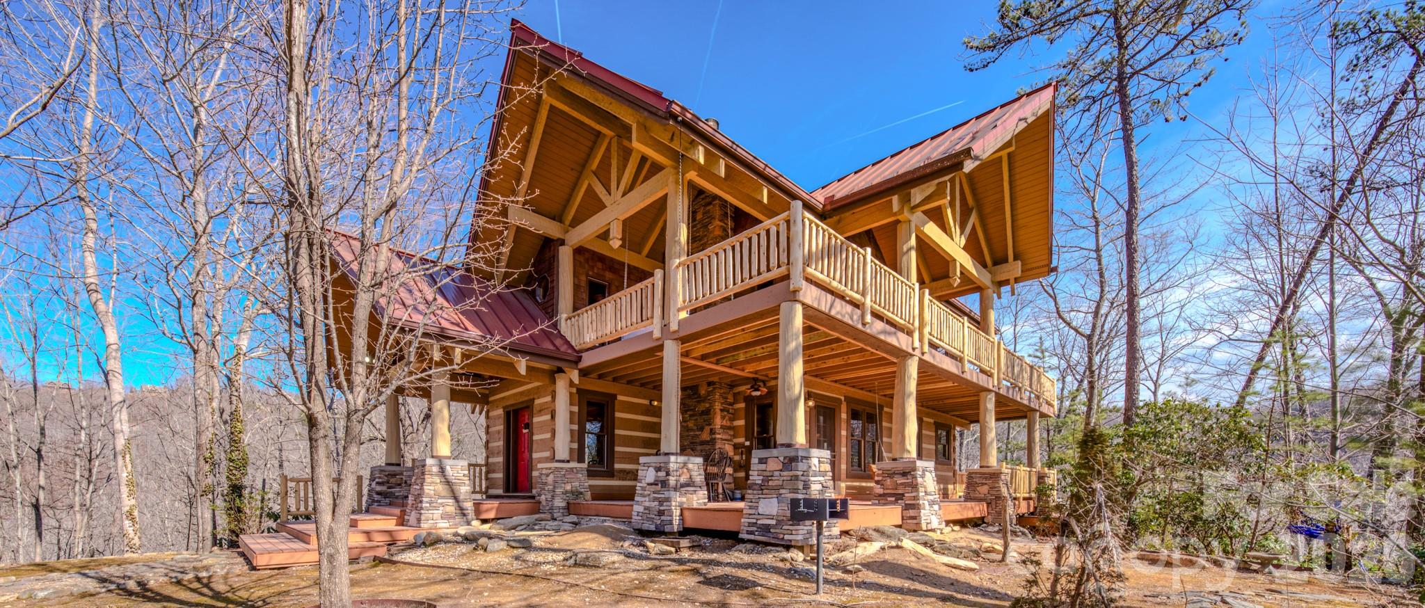 a view of a building with a yard