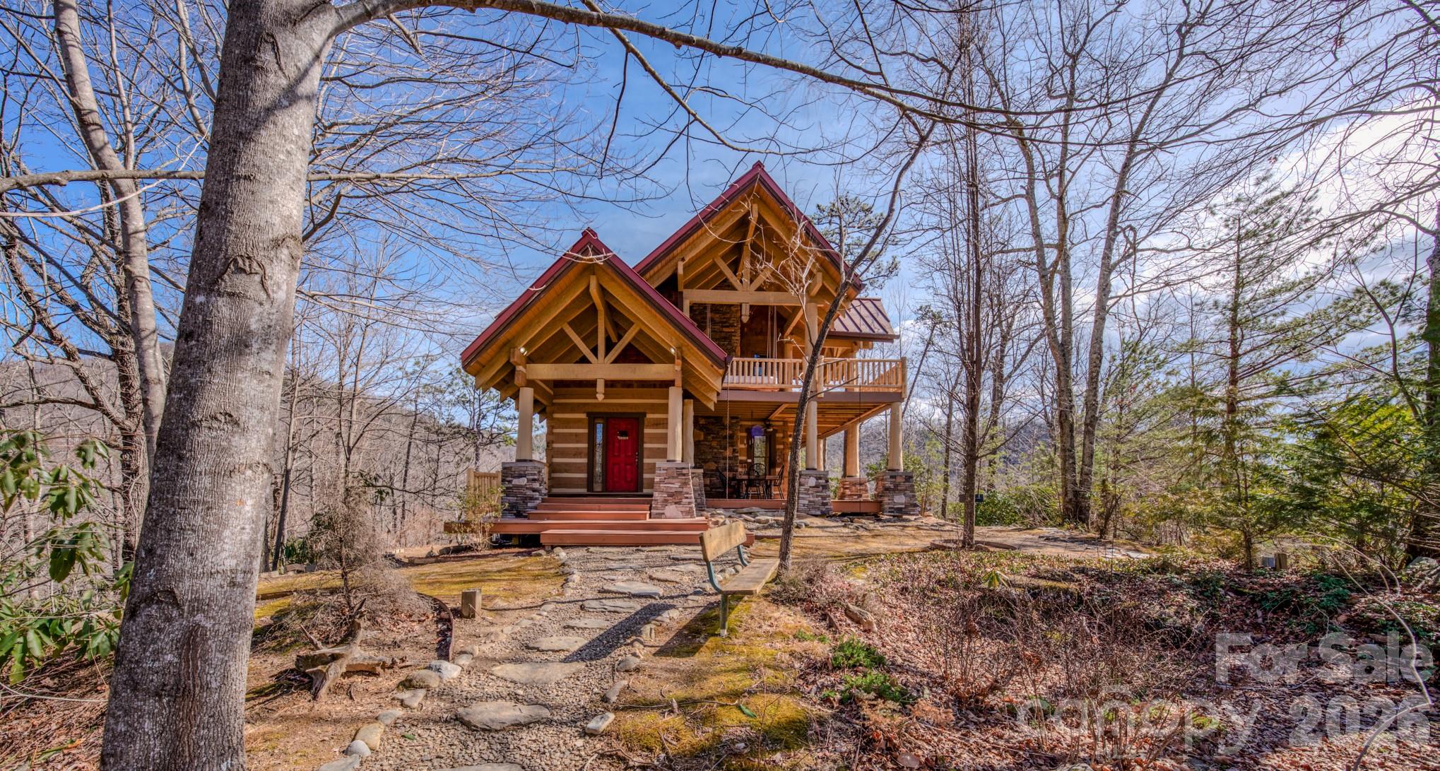 277 Long Ridge Road, Unit 882 889 Old Fort, NC 28762 - Photo 13 of 41 a front view of a house with a yard