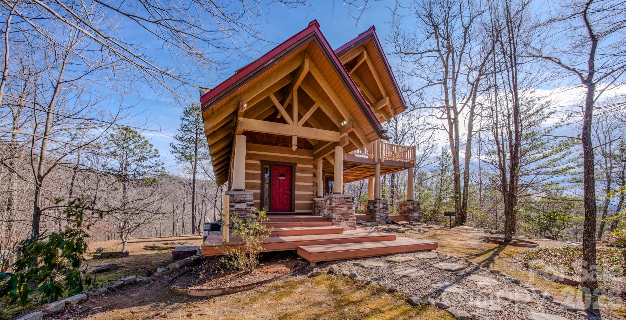 277 Long Ridge Road, Unit 882 889 Old Fort, NC 28762 - Photo 16 of 41 a front view of house with a yard and trees around