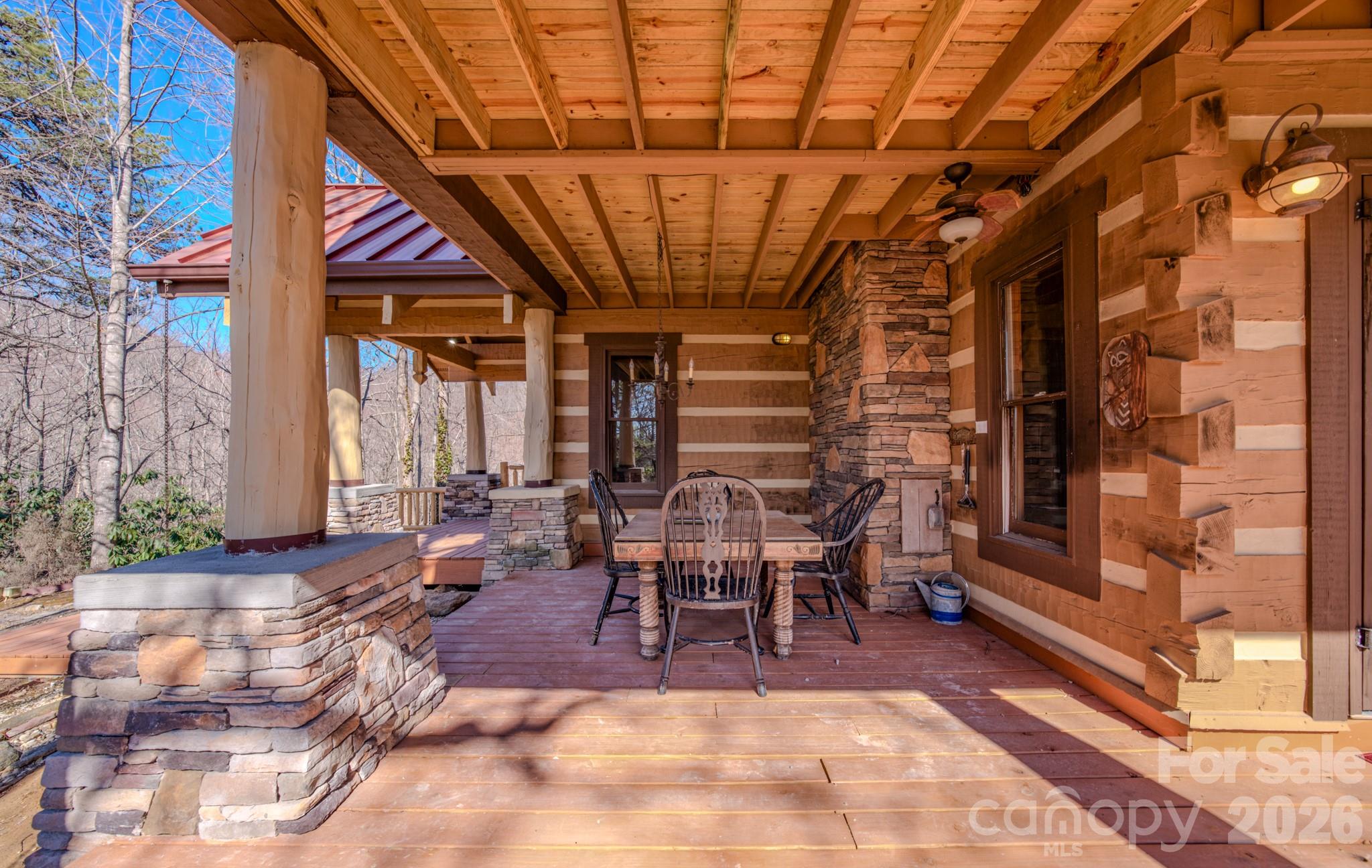 277 Long Ridge Road, Unit 882 889 Old Fort, NC 28762 - Photo 20 of 42 a view of a porch with furniture and a yard
