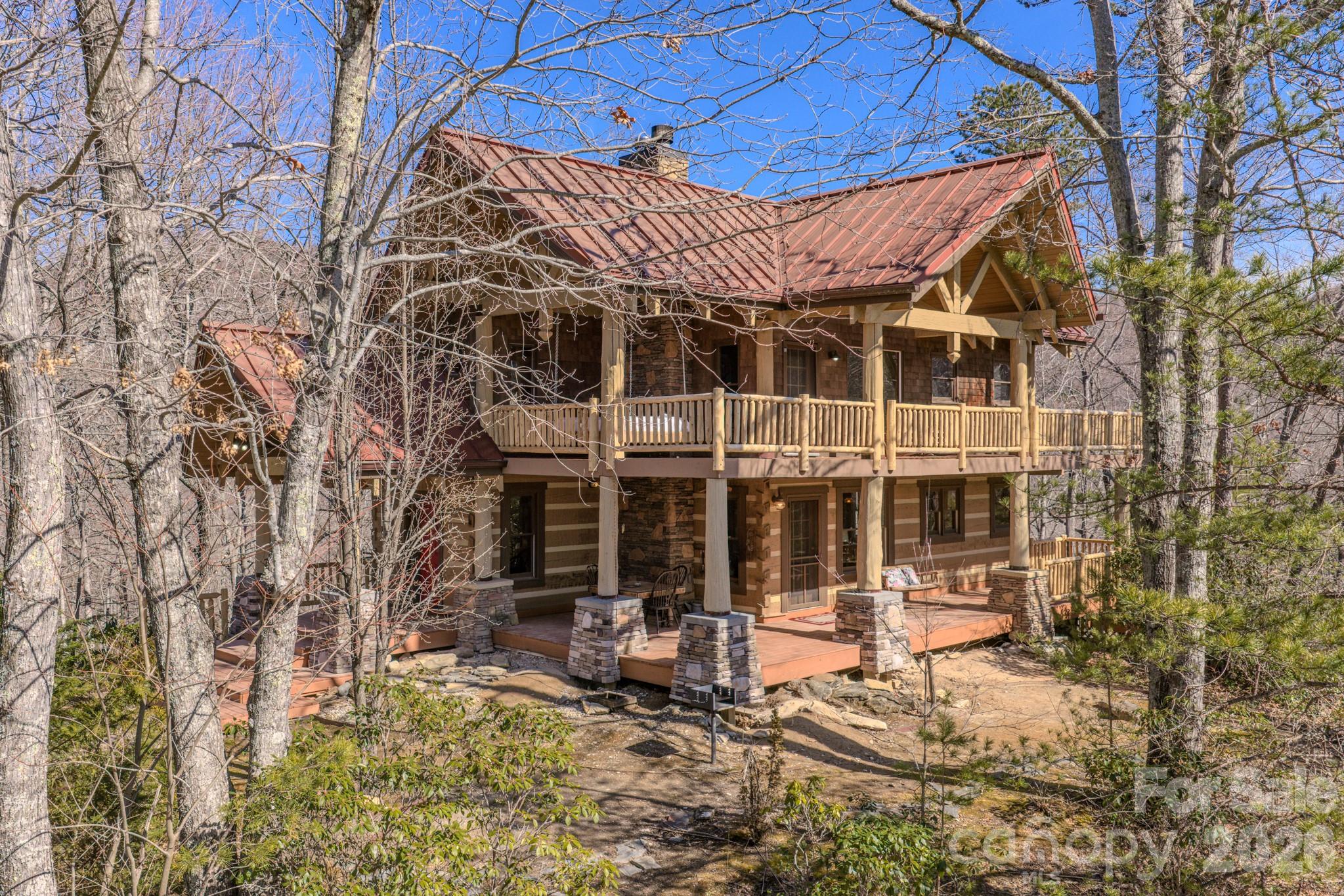 277 Long Ridge Road, Unit 882 889 Old Fort, NC 28762 - Photo 2 of 41 a view of a house with yard and sitting area