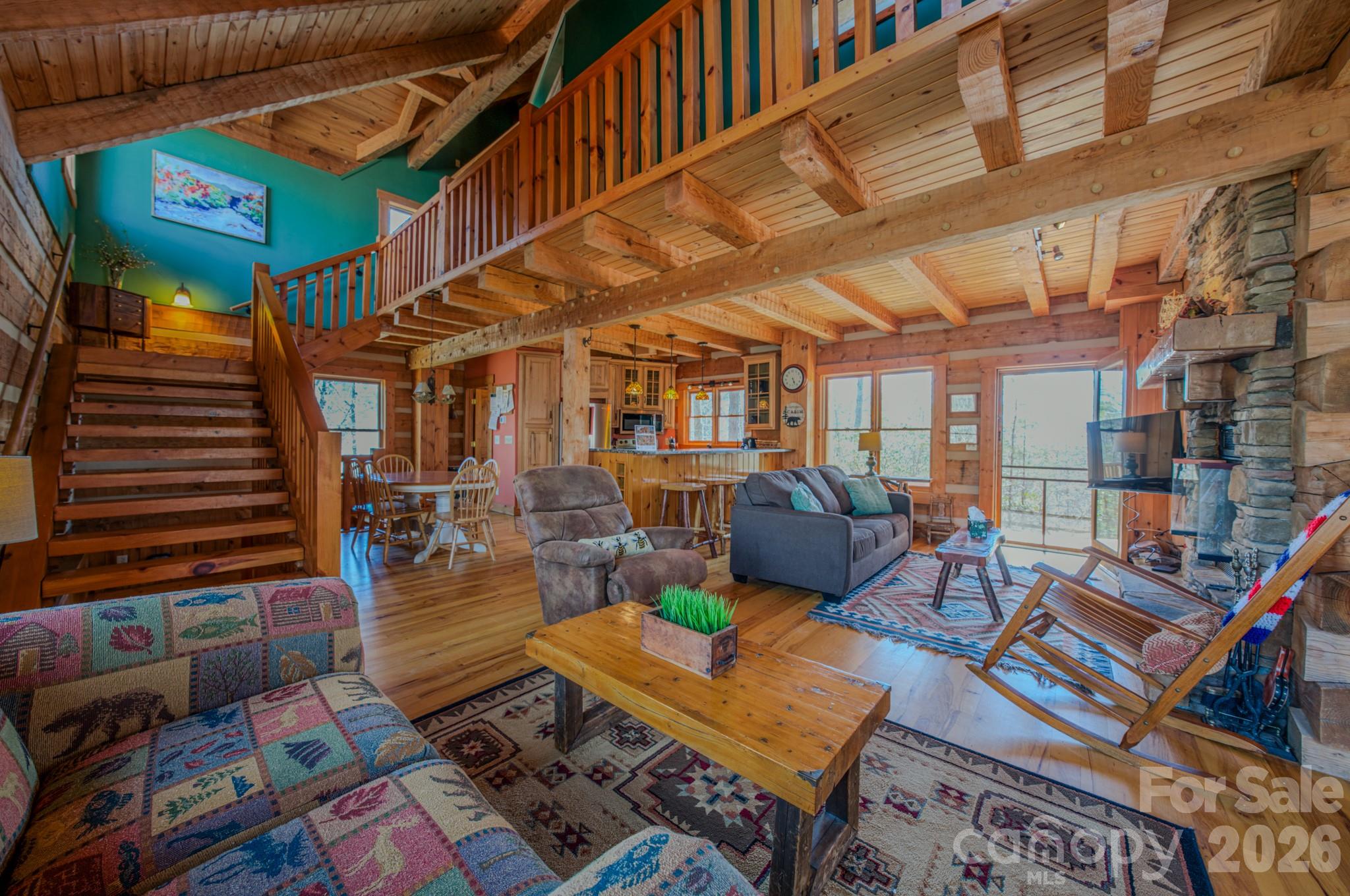 277 Long Ridge Road, Unit 882 889 Old Fort, NC 28762 - Photo 23 of 41 a outdoor living space with patio furniture and a rug