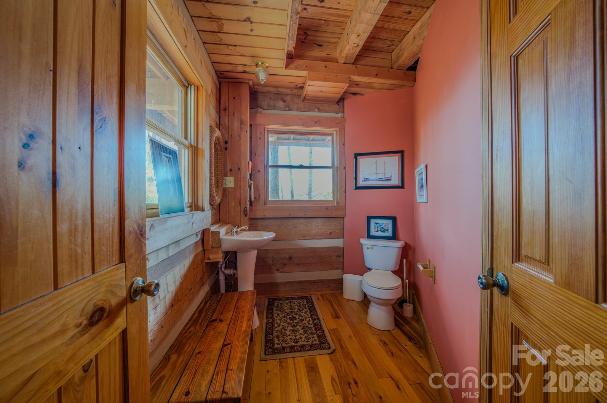 277 Long Ridge Road, Unit 882 889 Old Fort, NC 28762 - Photo 28 of 42 a bathroom with a sink and a toilet