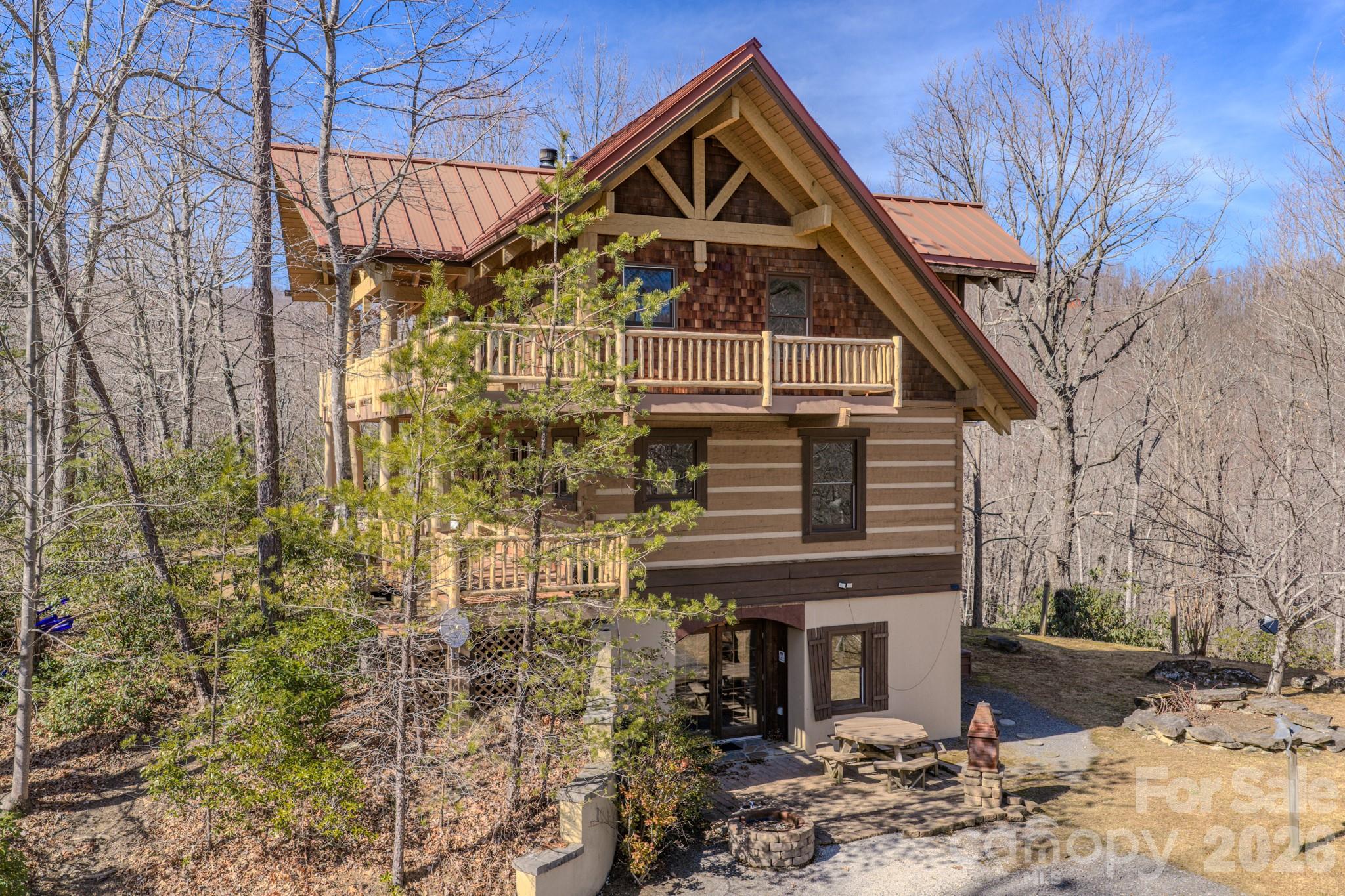 277 Long Ridge Road, Unit 882 889 Old Fort, NC 28762 - Photo 5 of 41 a front view of a house with a yard