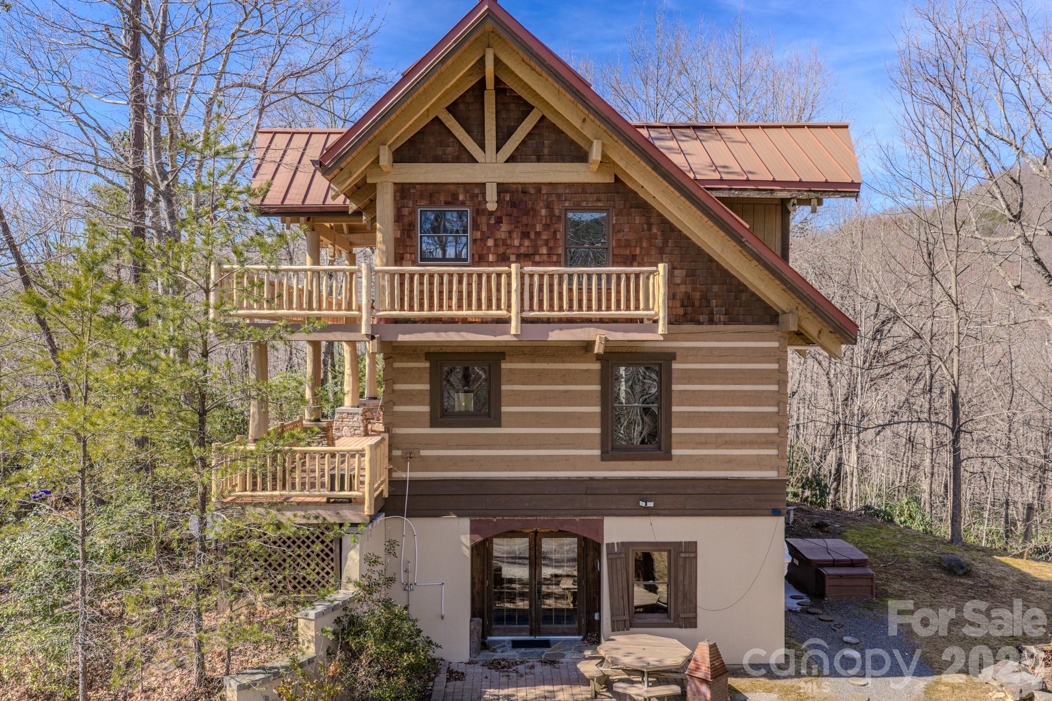 277 Long Ridge Road, Unit 882 889 Old Fort, NC 28762 - Photo 6 of 41 a front view of a house with garage