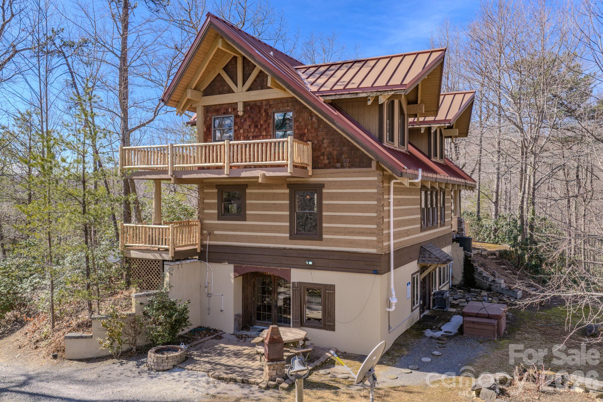 277 Long Ridge Road, Unit 882 889 Old Fort, NC 28762 - Photo 7 of 41 a front view of a house with garden