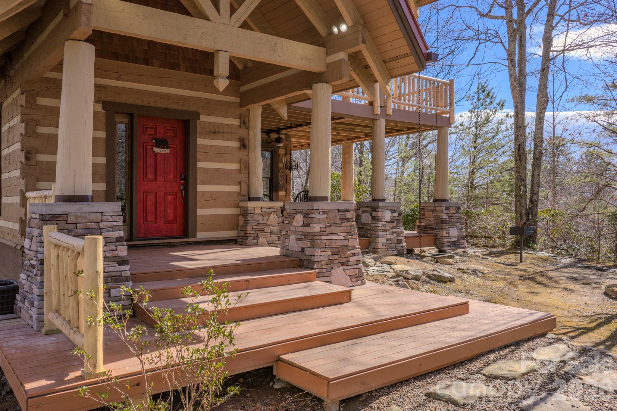 277 Long Ridge Road, Unit 882 889 Old Fort, NC 28762 - Photo 8 of 41 a front view of a house with a yard