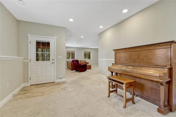 a room with furniture and a window