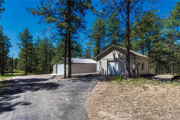a house view with a backyard space