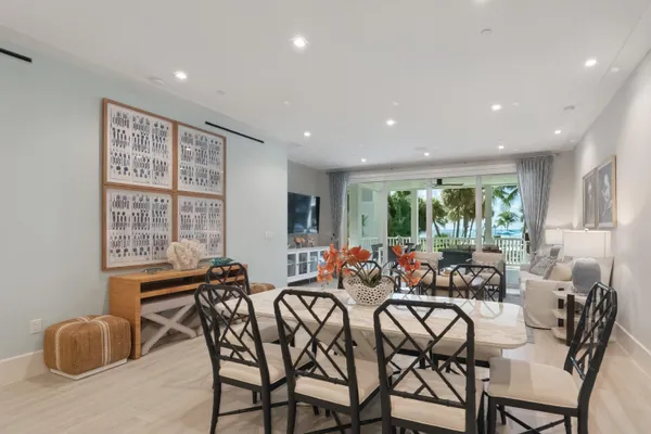 a view of swimming pool with outdoor seating and plants