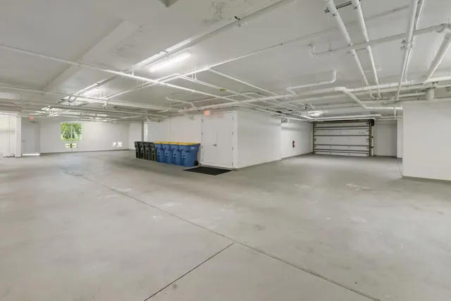 a very nice looking dining room with furniture window and outside view