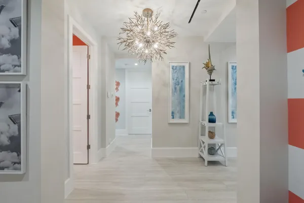 a bathroom with a sink vanity mirror and toilet