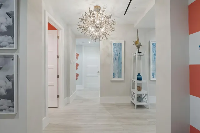 a bathroom with a sink vanity mirror and toilet