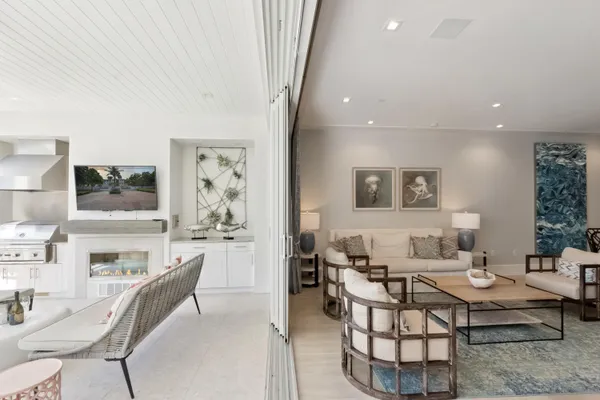 a view of a swimming pool with a patio