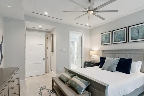 a front view of a house with garden and porch