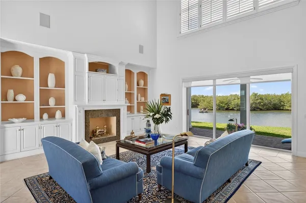 a living room with furniture and a table
