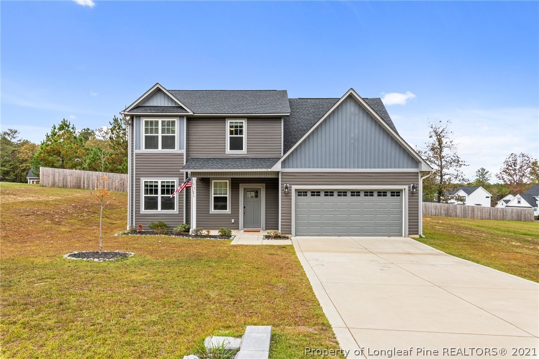 171 Apache Trail Sanford, NC 27332 - Photo 2 of 38 a front view of house with outdoor space