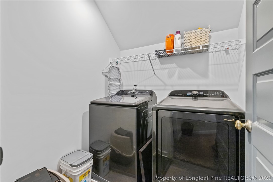 171 Apache Trail Sanford, NC 27332 - Photo 30 of 38 a utility room with dryer and washer