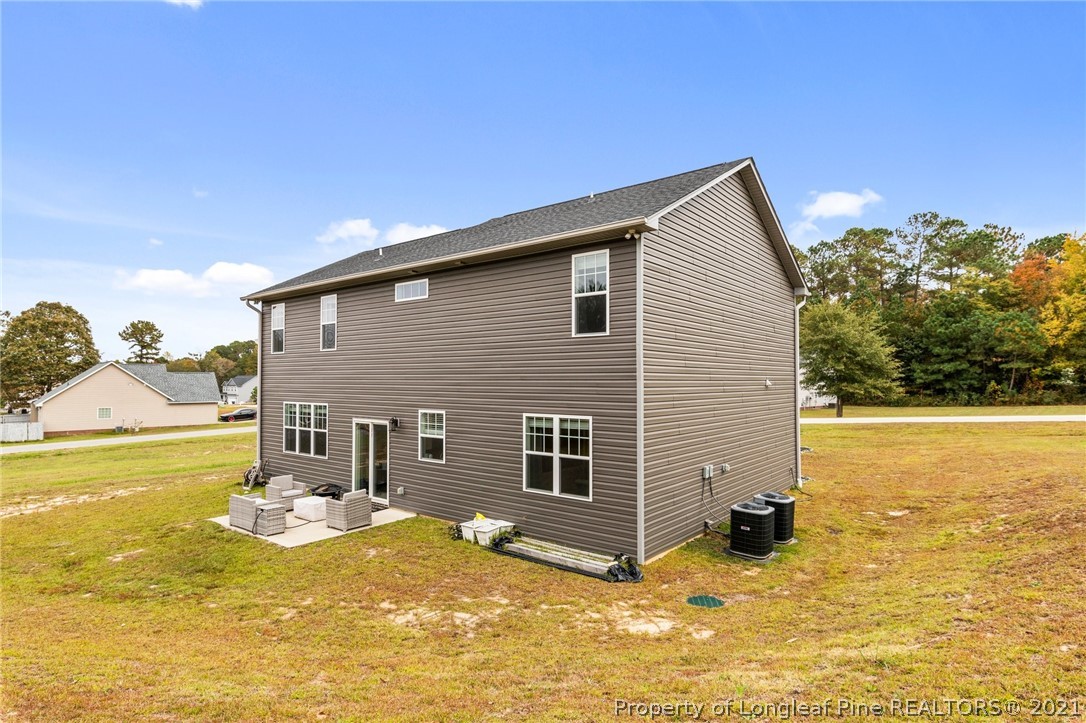 171 Apache Trail Sanford, NC 27332 - Photo 38 of 38 a view of a house with a yard