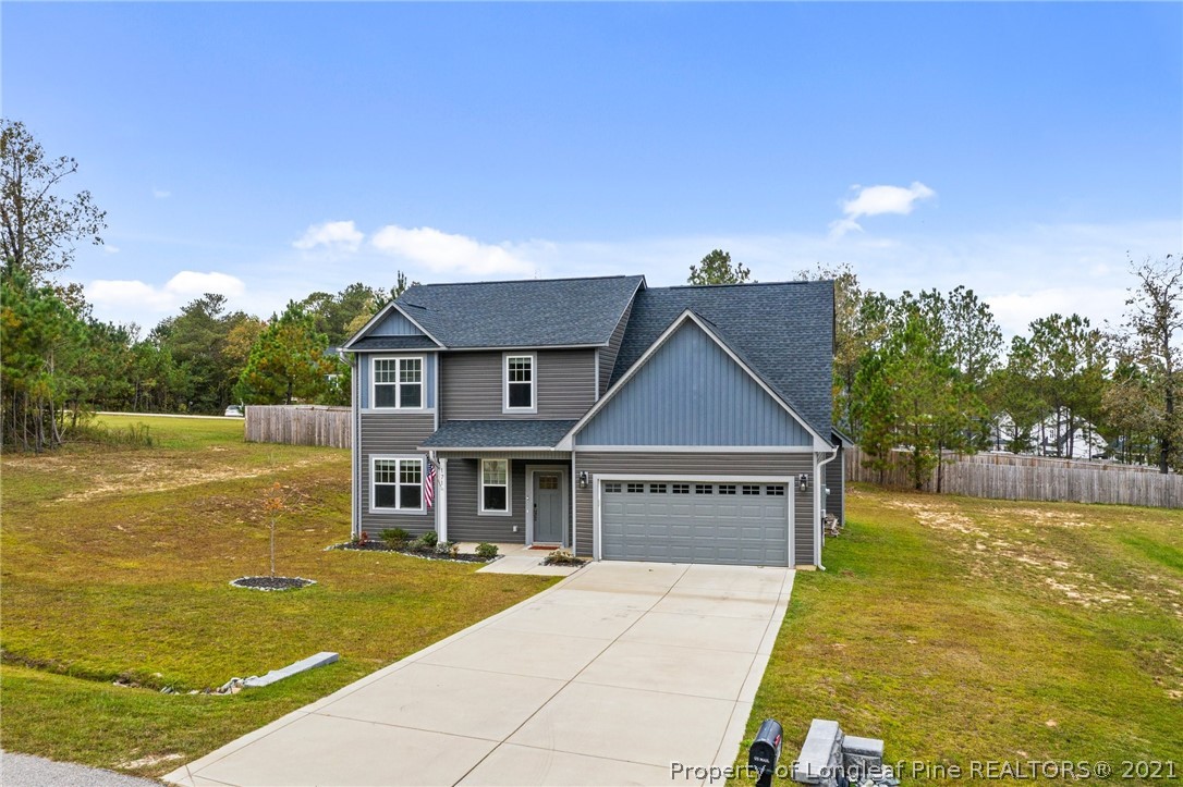 171 Apache Trail Sanford, NC 27332 - Photo 6 of 38 a view of a house with a ocean view