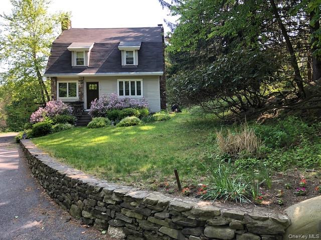 47 Mine Hill Road Cornwall, NY 12518 - Photo 1 of 45 a view of a brick house with a yard