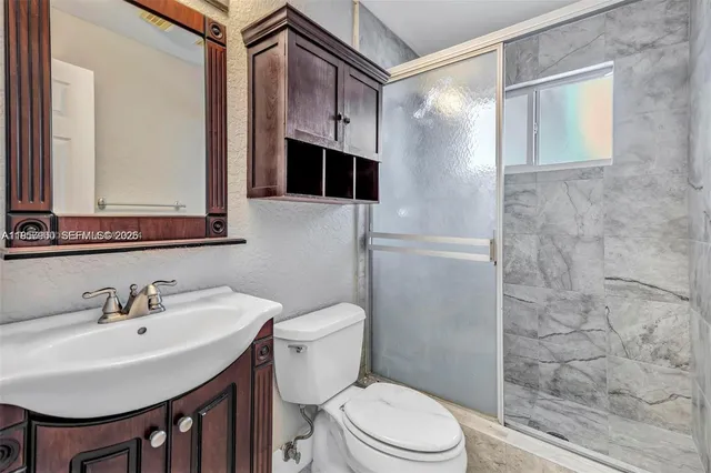 a living room with furniture a rug and a window