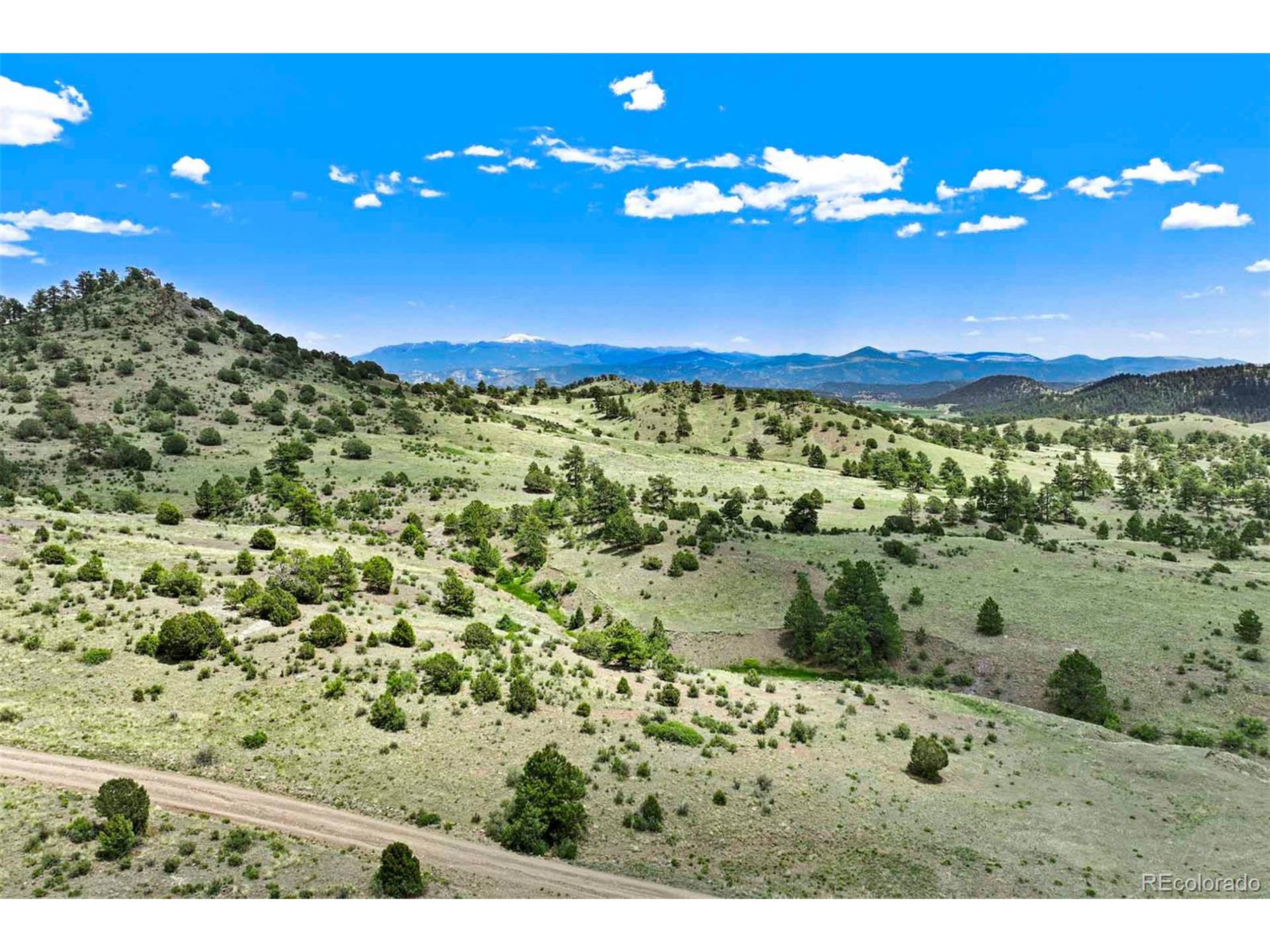 3 County Road 102 Guffey, CO 80820 - Photo 13 of 16 a view of a of a building with a swimming pool