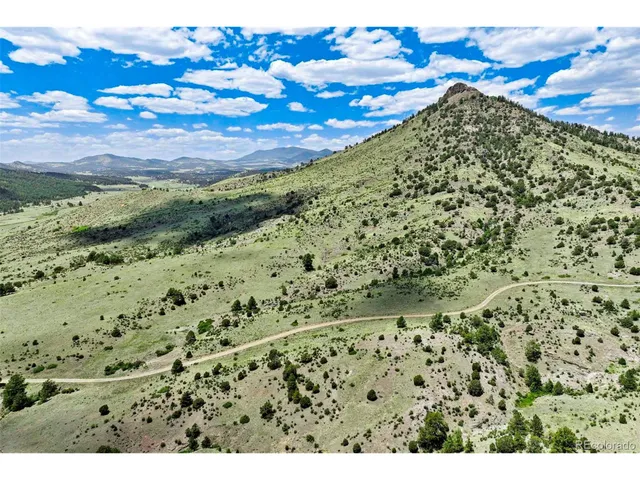 a view of a yard with an ocean