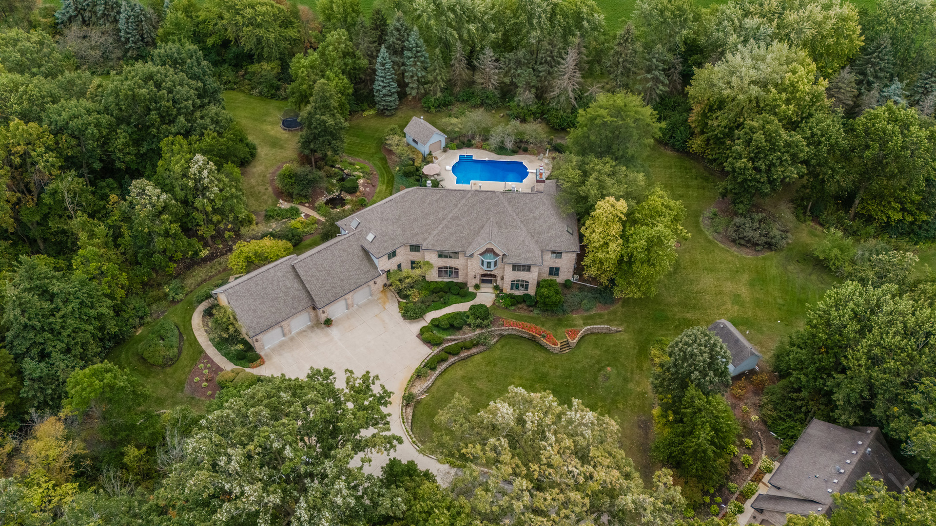 3S201 South Raddant Road Batavia, IL 60510 - Photo 3 of 58 an aerial view of a house with outdoor space