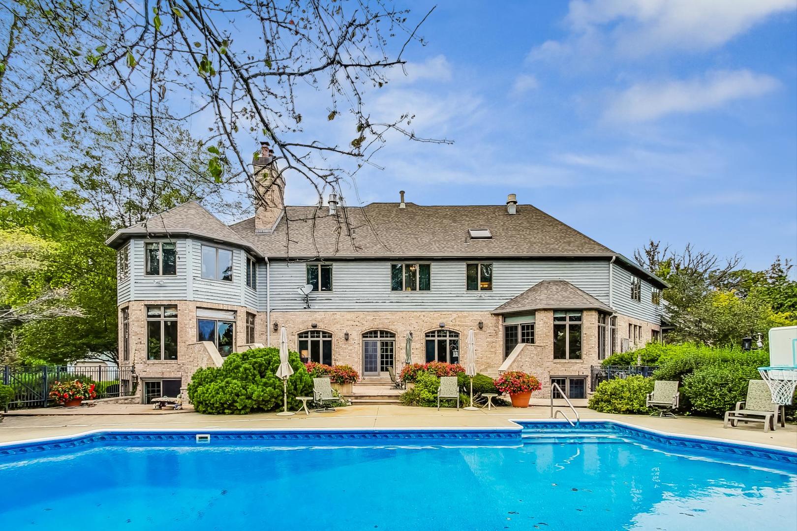 3S201 South Raddant Road Batavia, IL 60510 - Photo 47 of 58 a front view of house with yard and patio