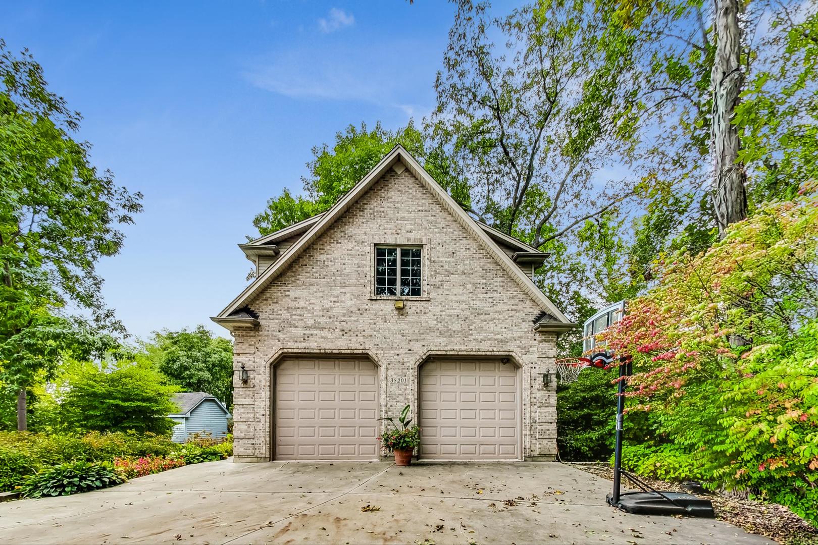 3S201 South Raddant Road Batavia, IL 60510 - Photo 58 of 58 a front view of a house with a garage