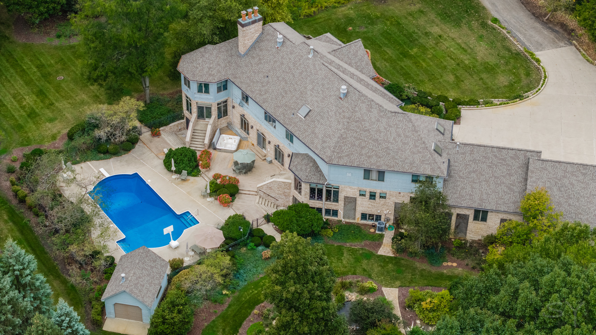 3S201 South Raddant Road Batavia, IL 60510 - Photo 6 of 58 an aerial view of house with yard swimming pool and outdoor seating