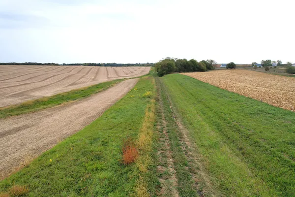 a view of a lake with a yard