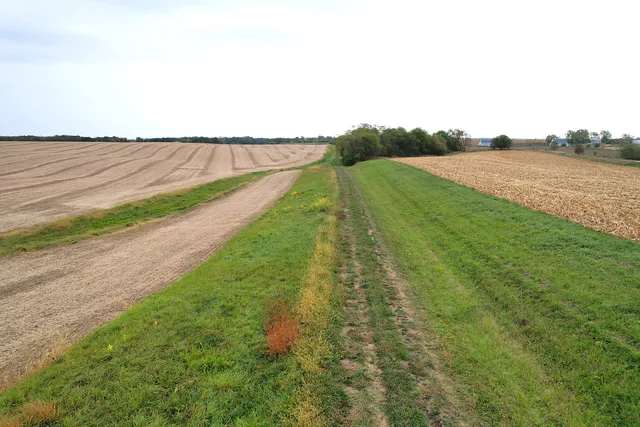 a view of a lake with a yard