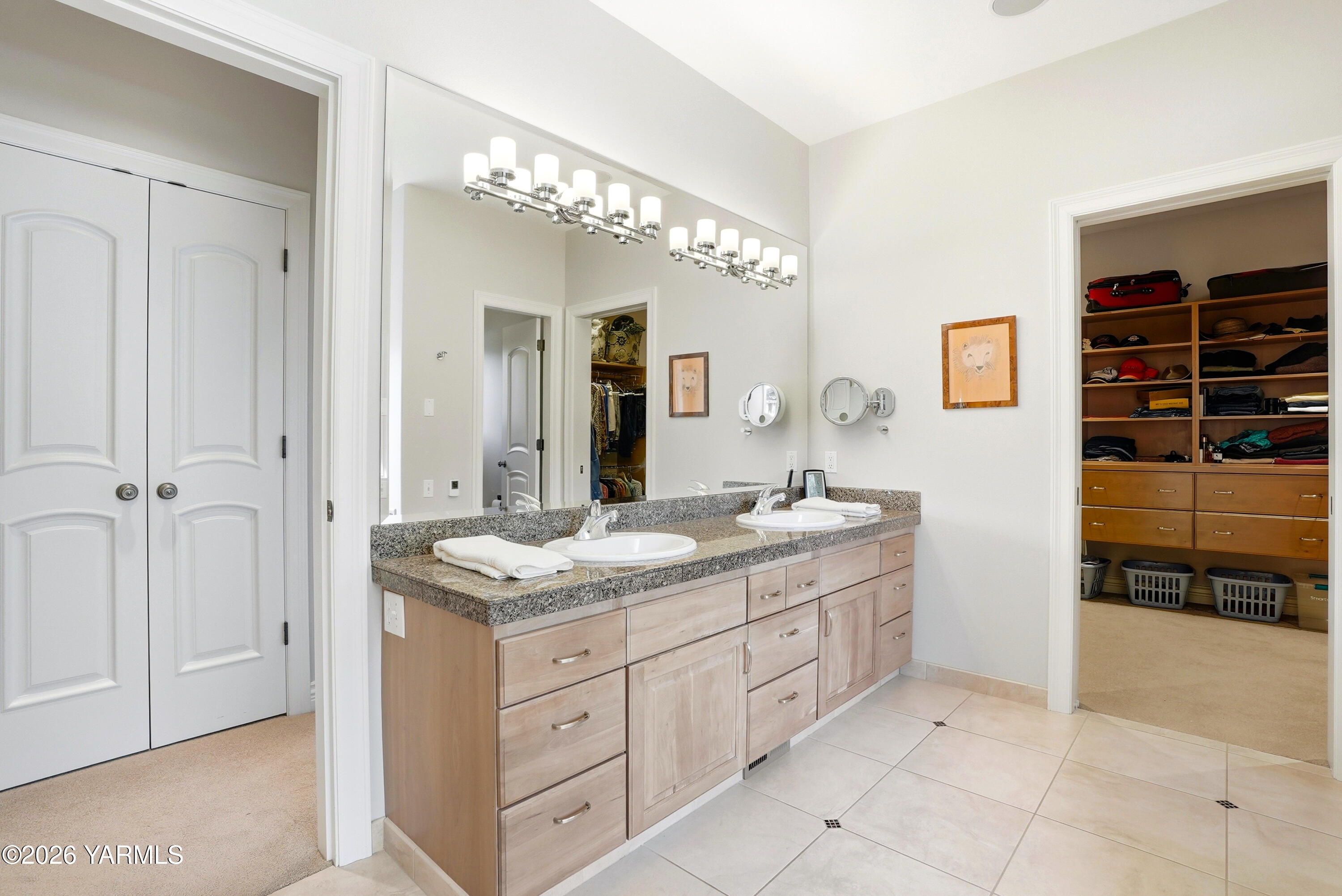 660 Noble Hill Road Yakima, WA 98908 - Photo 24 of 63 a spacious bathroom with a granite countertop sink a mirror and a vanity