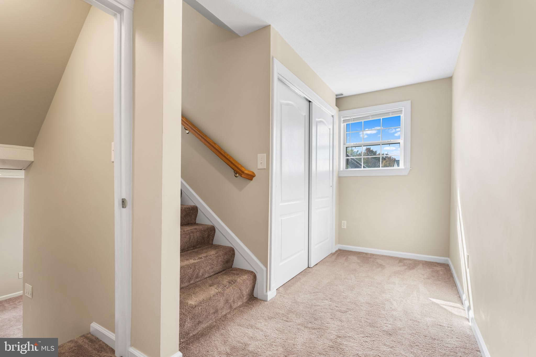 3836 Dakota Road Hampstead, MD 21074 - Photo 23 of 47 a view of a hallway with staircase