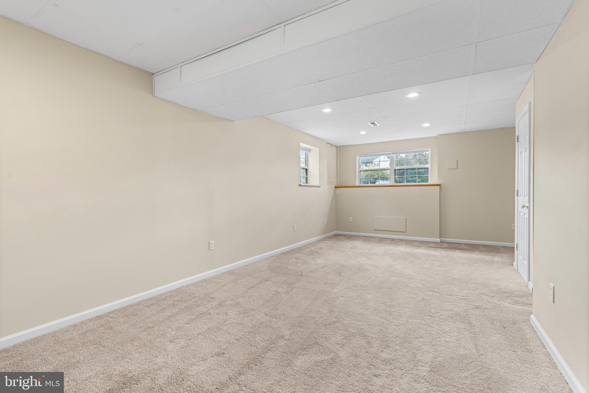 3836 Dakota Road Hampstead, MD 21074 - Photo 26 of 47 an empty room with white walls and garage