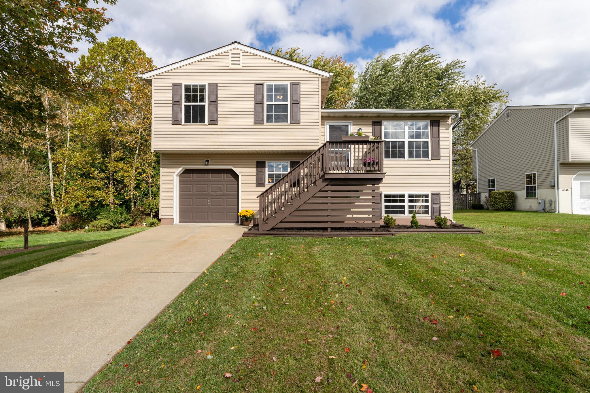 3836 Dakota Road Hampstead, MD 21074 - Photo 3 of 47 a front view of a house with a yard