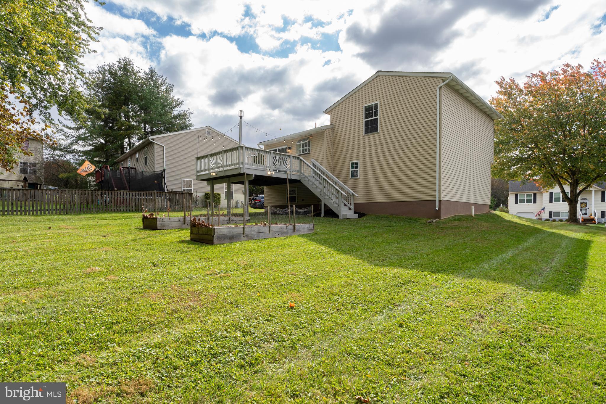 3836 Dakota Road Hampstead, MD 21074 - Photo 32 of 47 a front view of a house with garden